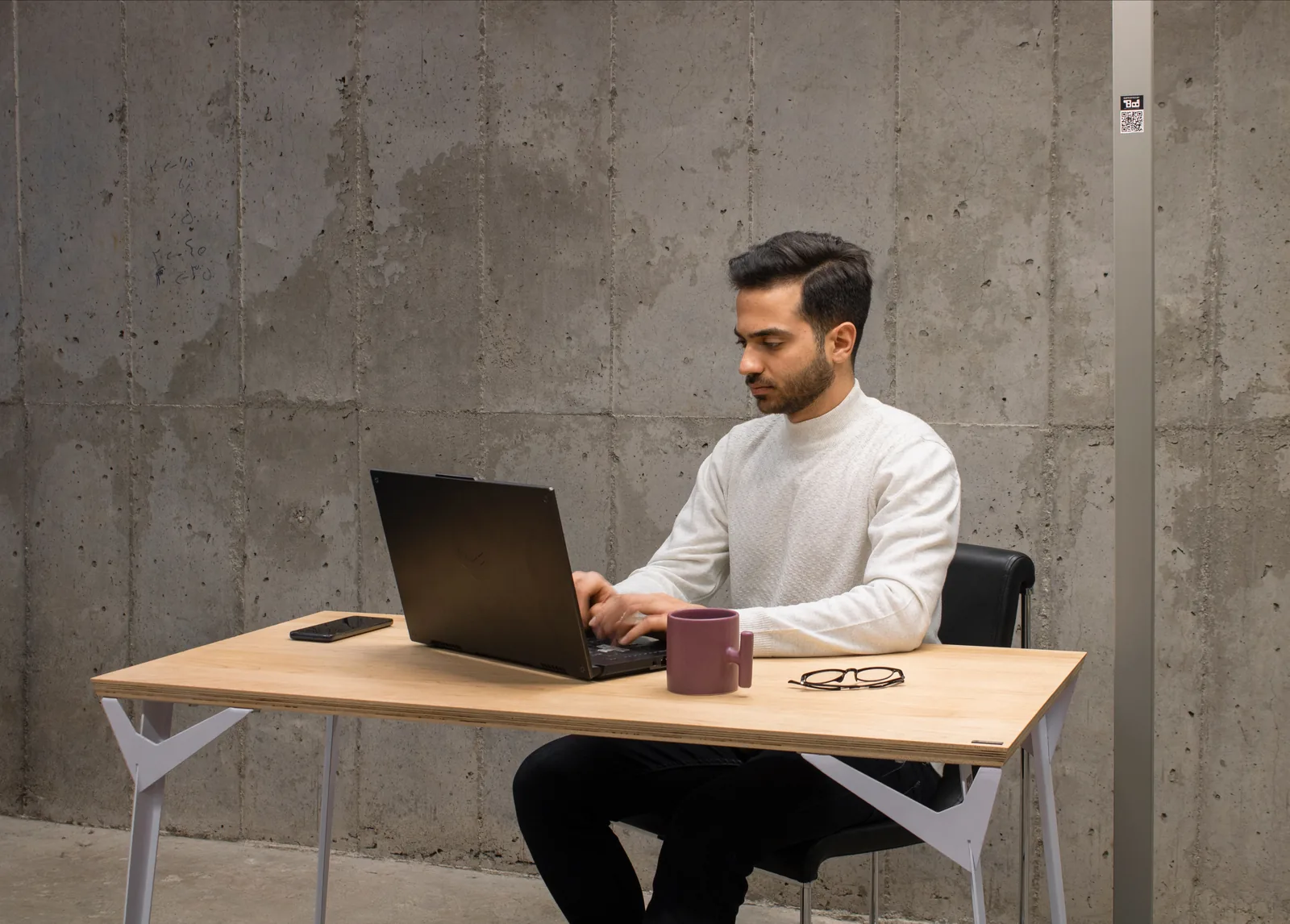man working on laptop - Types of Product Photography